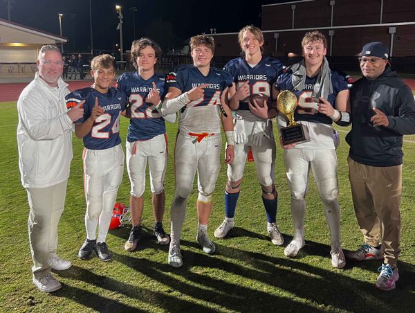 Tomball Christian Warriors coaches and players celebrate after winning 2023 national homeschool football title.